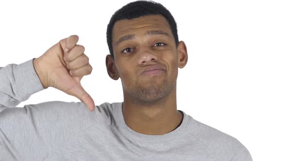 Portrait of AfroAmerican Man Gesturing Thumbs Down alt