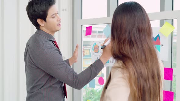 Business People Work on Project Planning Board alt