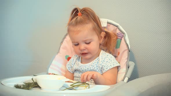 Children Sitting In Chair Kindergarten Eating Supplementary Healthy Food For Toddlers. Baby Eating. alt