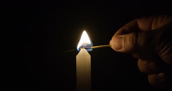 Lighting Single Candle - 4K alt