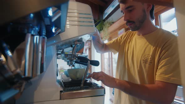 Barista Prepares Coffee in a Cafe alt