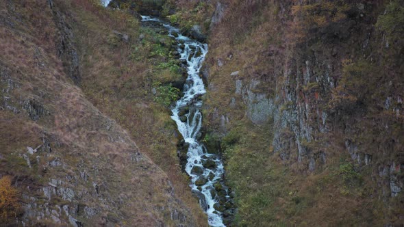 Wild mountain waterfall