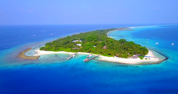 Daytime drone island view of a paradise sunny white sand beach and turquoise sea background in color alt