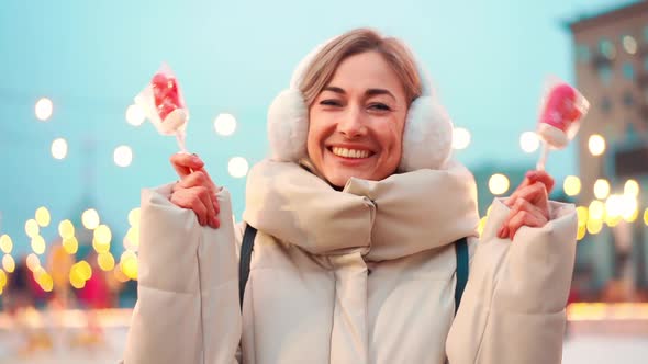 Joyful Middle Age Woman Enjoys Cold Winter Christmas Holiday Winter Standing City Street Seasonal alt
