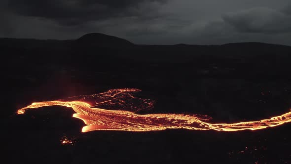Drone Over Flowing River Of Molten Lava From Erupting Volcano alt