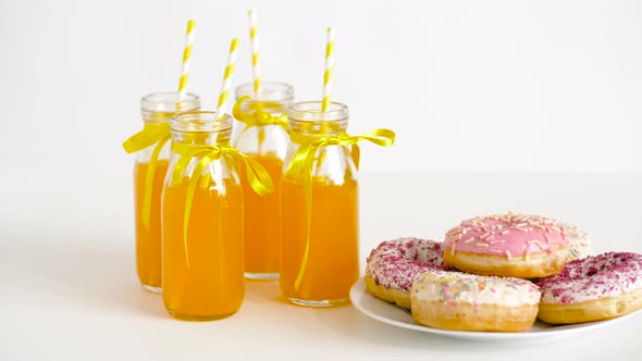 Donuts and Lemonade or Juice in Glass Bottles alt
