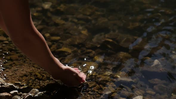 Woman enjoys  mountain spring freshness slow-mo  1080p FullHD footage - Crystal clear water in femal