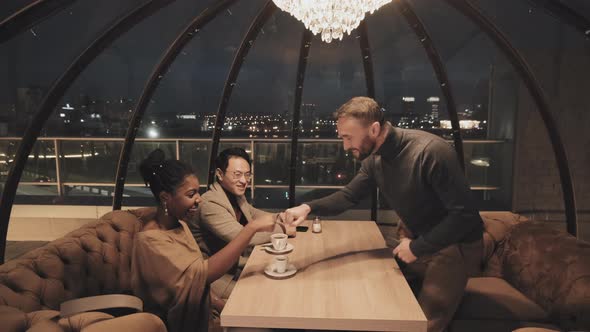 Man Meeting Friends in Fancy Restaurant alt