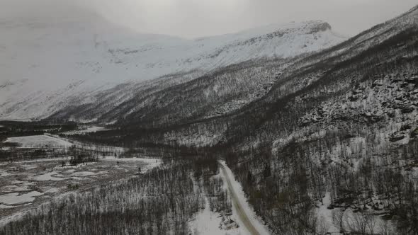 Harsh snowy winter landscape in arctic, Signaldalen valley; aerial alt