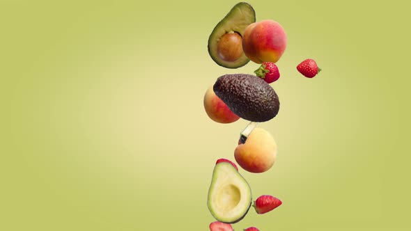 Peach Avocado and Strawberry Fruits Fall on a YellowGreen Background ...