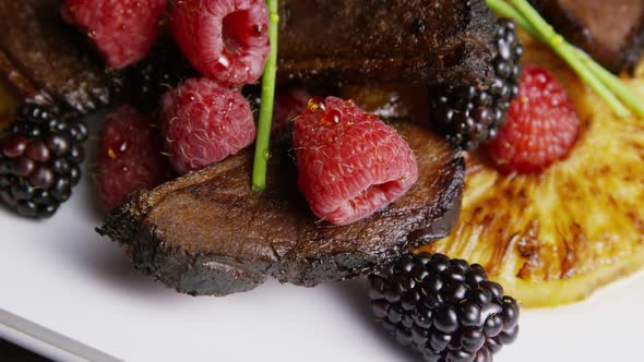 Rotating - smoked duck bacon with grilled pineapple, raspberries, blackberries and honey alt