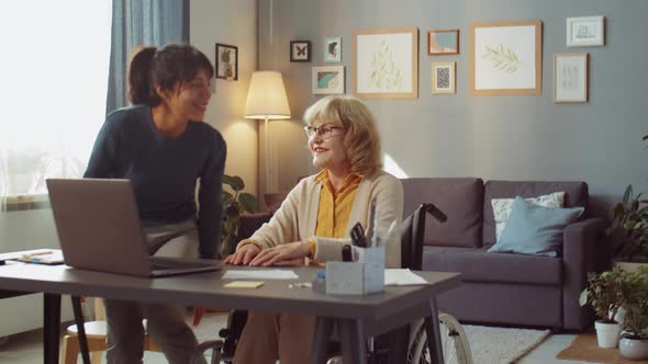 Helping Senior Woman With Papers alt