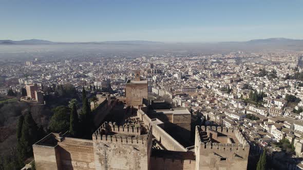 Moorish landmark the Alhambra fortress towers, Granada cityscape Background, Orbiting