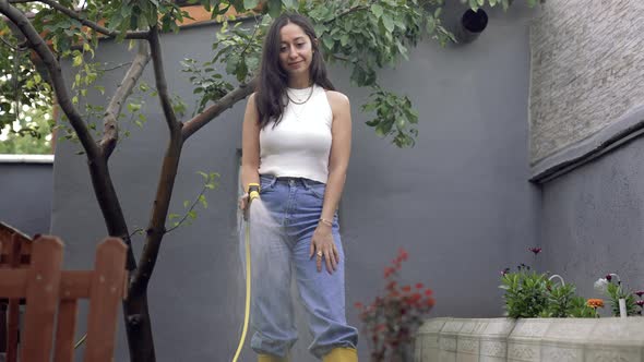 Girl Watering the Garden alt