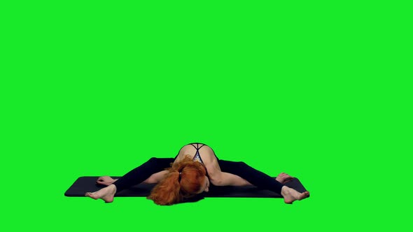 Athletic Sporty Woman Doing Yoga Exercises During Workout On Green Screen