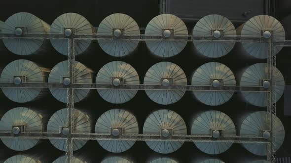 Aerial View of a Drone Flying Over the Beer Production Plant Several Rows of Tanks