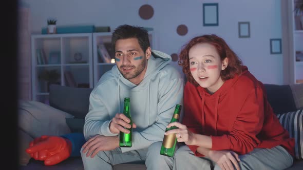 Diverse Fans Watching TV Drinking Beer alt