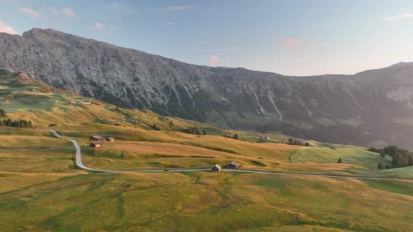 Sunrise in the Dolomites mountains with fog and mist. alt
