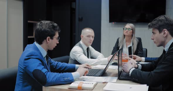 Director Listens to the Report of His Colleagues on the Development of the Company alt