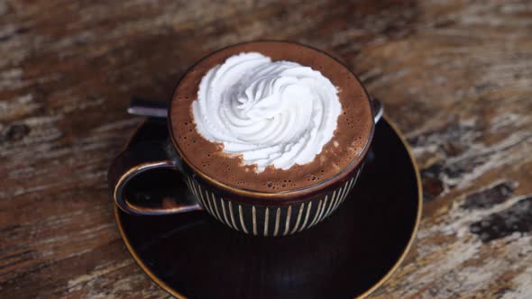 Top View of a Cup of Dairy Free Hot Chocolate with Cream on Top alt