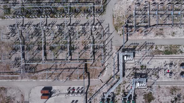 Aerial view of the grid of high voltage power lines and wires.