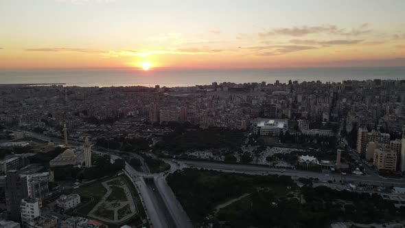 Drone shot - Flyover Beirut showing airport, park, and horse racing track