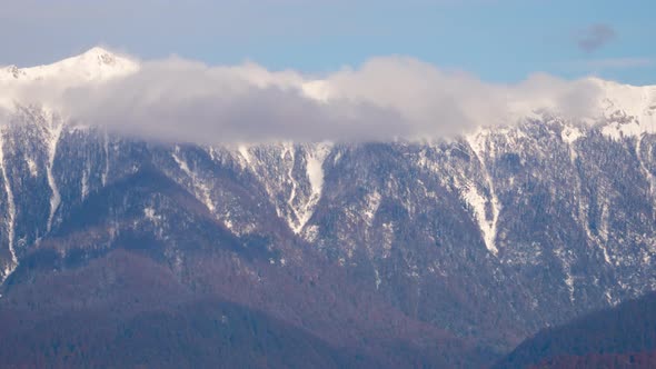 Snow Capped Mountains and Clouds