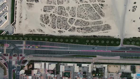 Top View on a Highway in Dubai with Some Traffic Aerial Shot alt