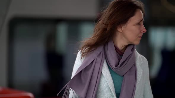Female Passenger on Open Platform of Railway Station, Waiting Arriving of Her Train alt