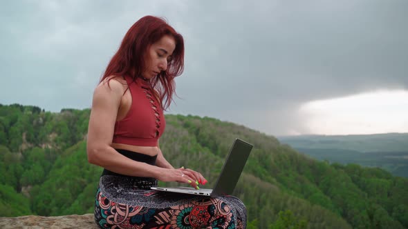 Woman Writer is Typing on Laptop Stunning Landscape alt