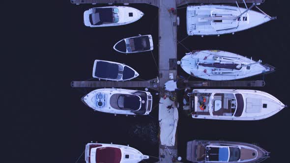 Flight Drone Summer Evening Over Yachts, Sailboats. Top View, Motion in the Frame From Top To Bottom