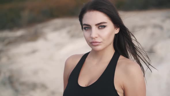 Slow Motion Attractive Sexy Young Athletic Woman Posing on the Seashore alt