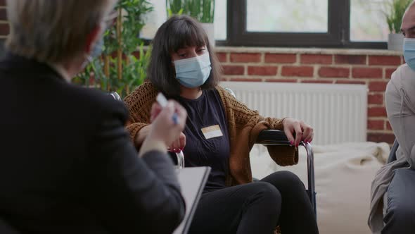 Close Up of Woman with Physical Disability Talking About Addiction and Depression at Aa Meeting alt