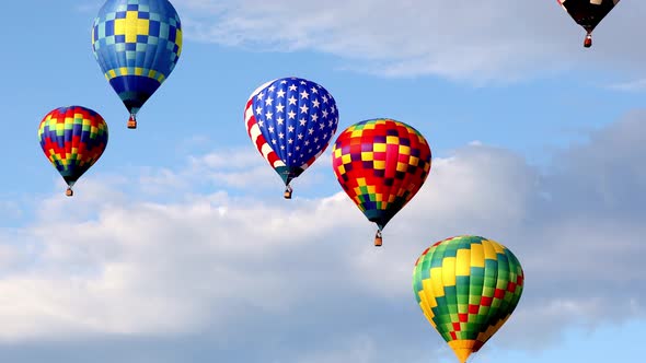 Colorful hot air balloons in the sky alt