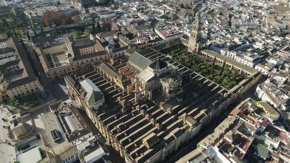 Aerial orbit view over architecturally impressive Mosque-Cathedral of Cordoba