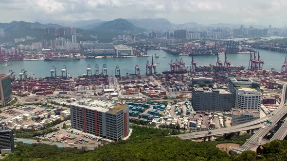Hong Kong Container Port Terminal and Logistics Center Timelapse Pan Up alt