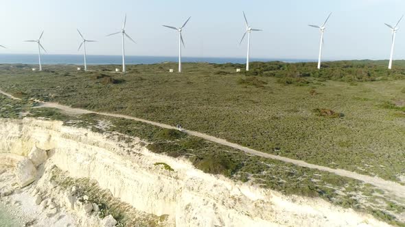 Wind Turbines And Cliffs Aerial View