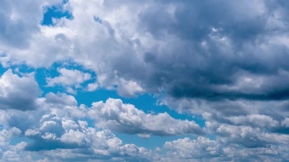 Timelapse of Cumulus Clouds Moving in the Blue Sky Cloud Space alt