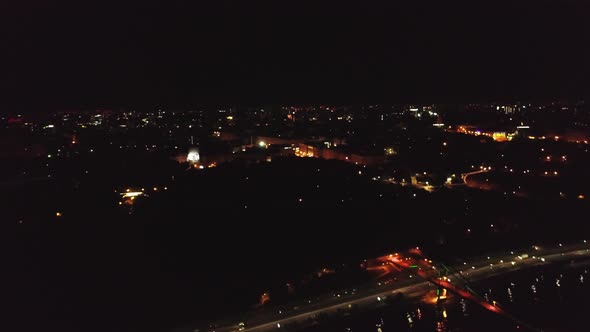 Aerial Drone Footage of Night Kyiv. Walking Bridge at Night