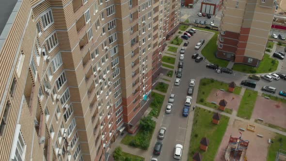 Bird's-eye View of the City Landscape, City High Houses, Streets, Cars. alt