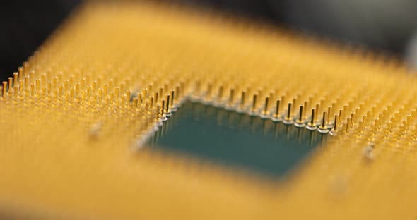 Macro Golden Microprocessor Computer Parts Closeup  Movie Slow Motion alt