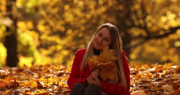 Little Daughter Running To Mother in Autumn Park