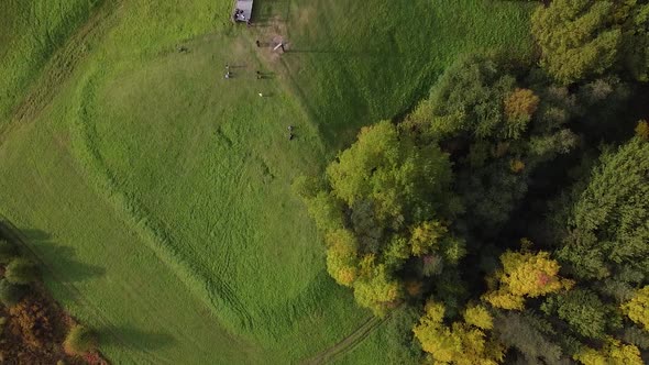 Village on a Hill in the Forest Drone Shooting