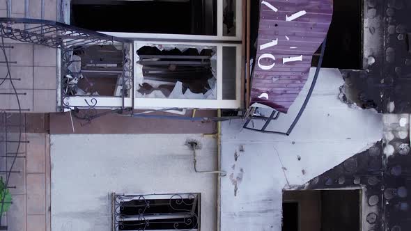 Vertical Video of a Destroyed Residential Building During the War in Ukraine alt