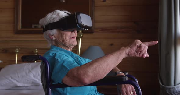 Woman using virtual reality headset at home 4k