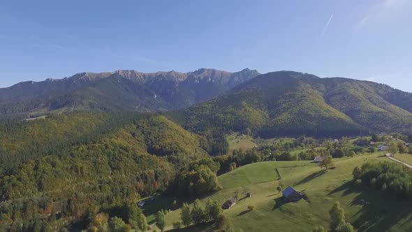 Scenic rural landscape surrounded by Carpathian Mountains