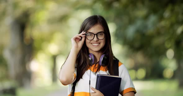 Female Student Smiling in Park