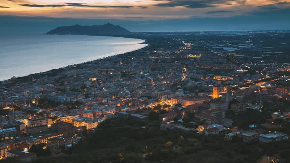 Terracina, Italy Top View Skyline Cityscape City In Evening Night City Illuminations 4K