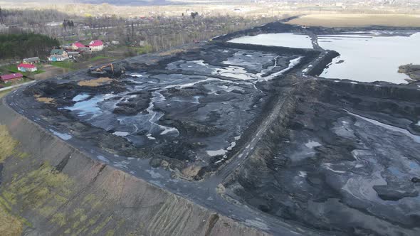 Aerial Drone Flight Over Wetlands Extraction of Black Soil of Fertile Land with Minerals alt
