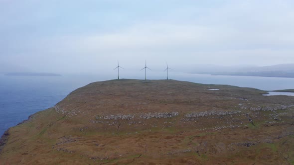 Aerial View of Wind Turbines and Ocean